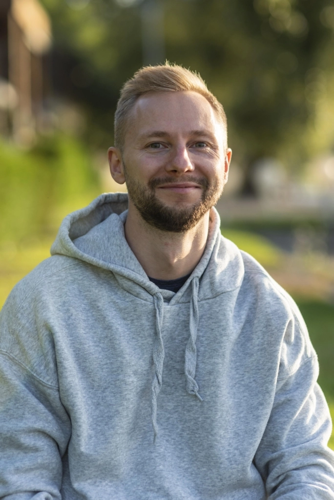 smiley-man-relaxing-outdoors